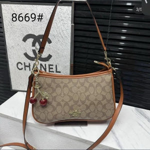 Velmora New York Signature Handbag – Brown ( Coach )