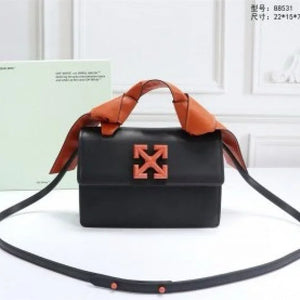 Velmora Jitney 1.4 Shoulder Bag – Gummy Orange Black arrows  Edition ( Off-White )
